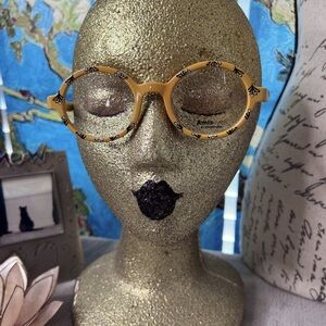 Amiseyes yellow and white spectacles.